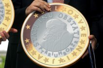 Euro zone gains another member as Slovenia adopts the euro